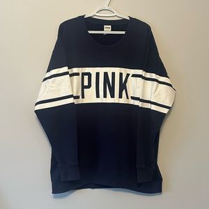 Navy blue varsity-style sweatshirt from PINK.
Size L